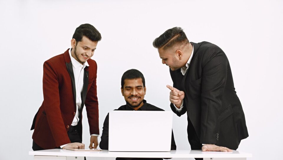 three-men-discussing-ideas-white-wall-indian-nationality_1157-47451